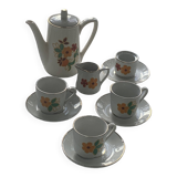 Dinette en porcelaine pour poupées composee d une cafetière, tasses et soucoupes, vintage