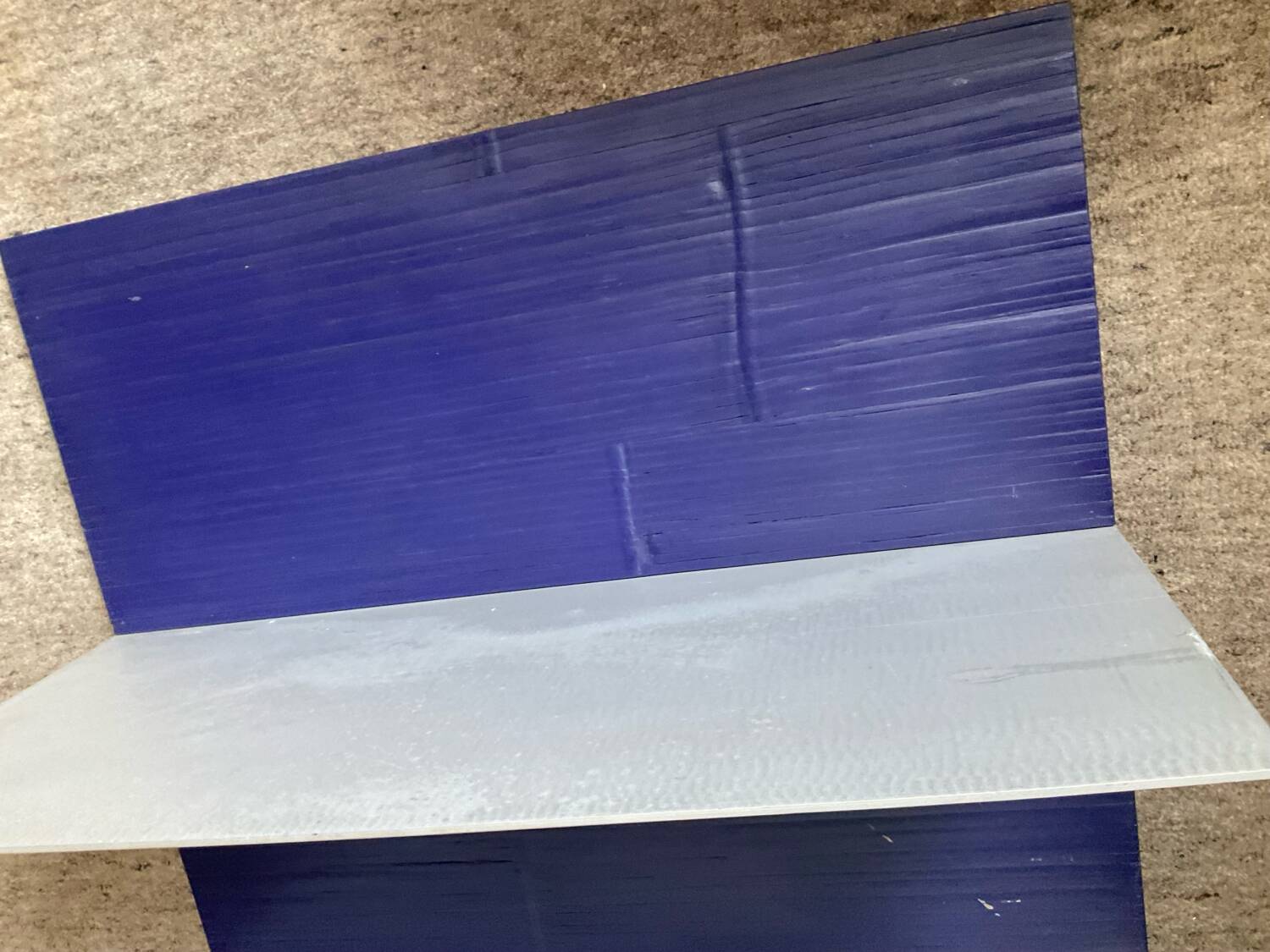 Pair of contemporary shelves in aluminum and stained wood