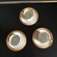 3 coffee cups and saucers in Limoges porcelain