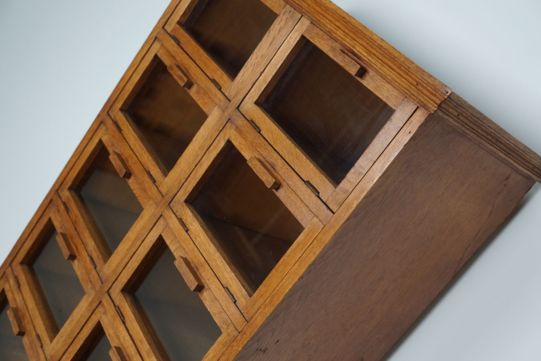 Vintage dutch oak haberdashery shop cabinet / vitrine drop down doors, 1930s