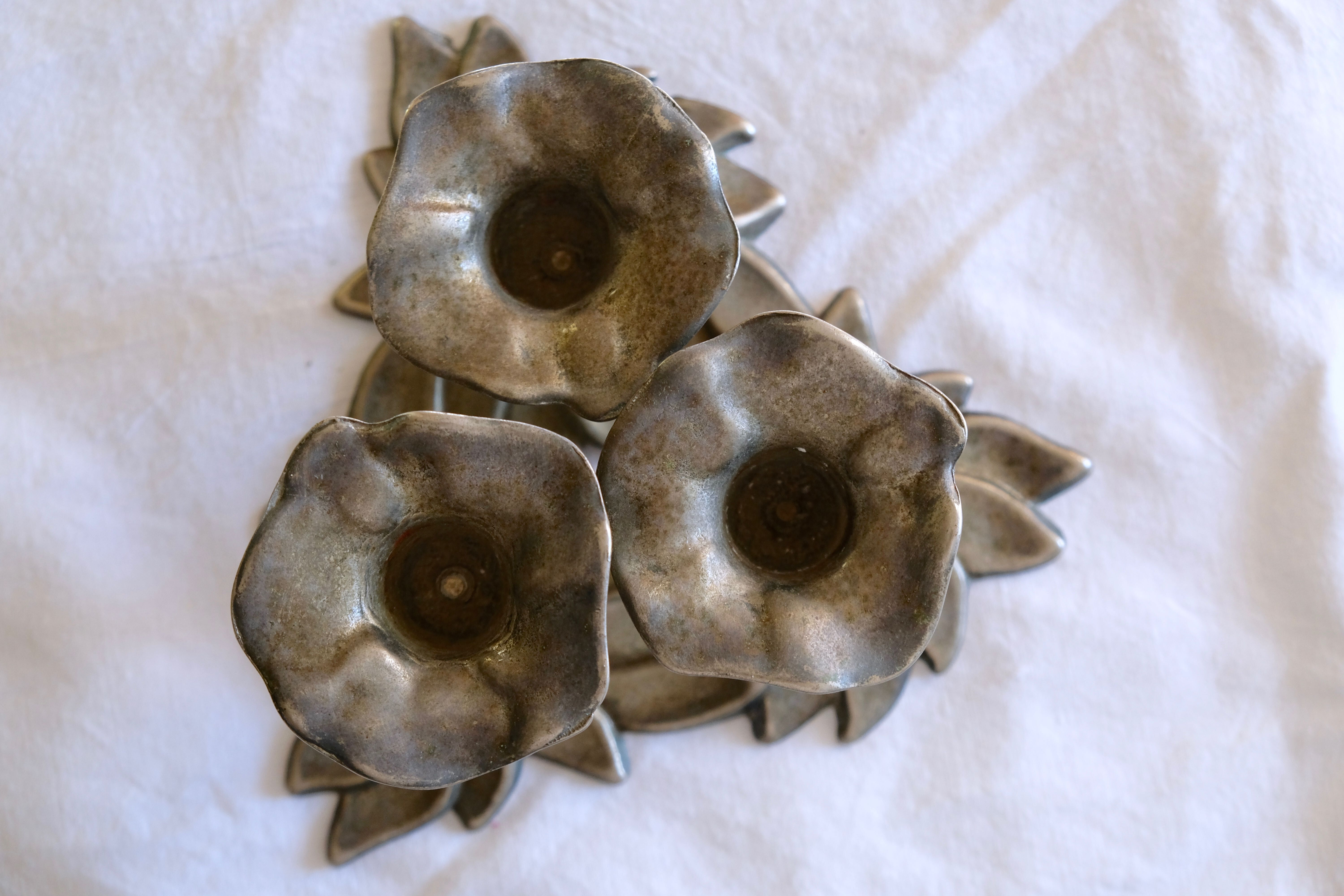 Three-flower pedestal 19th century candlestick