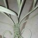 Duo of wrought iron shelves