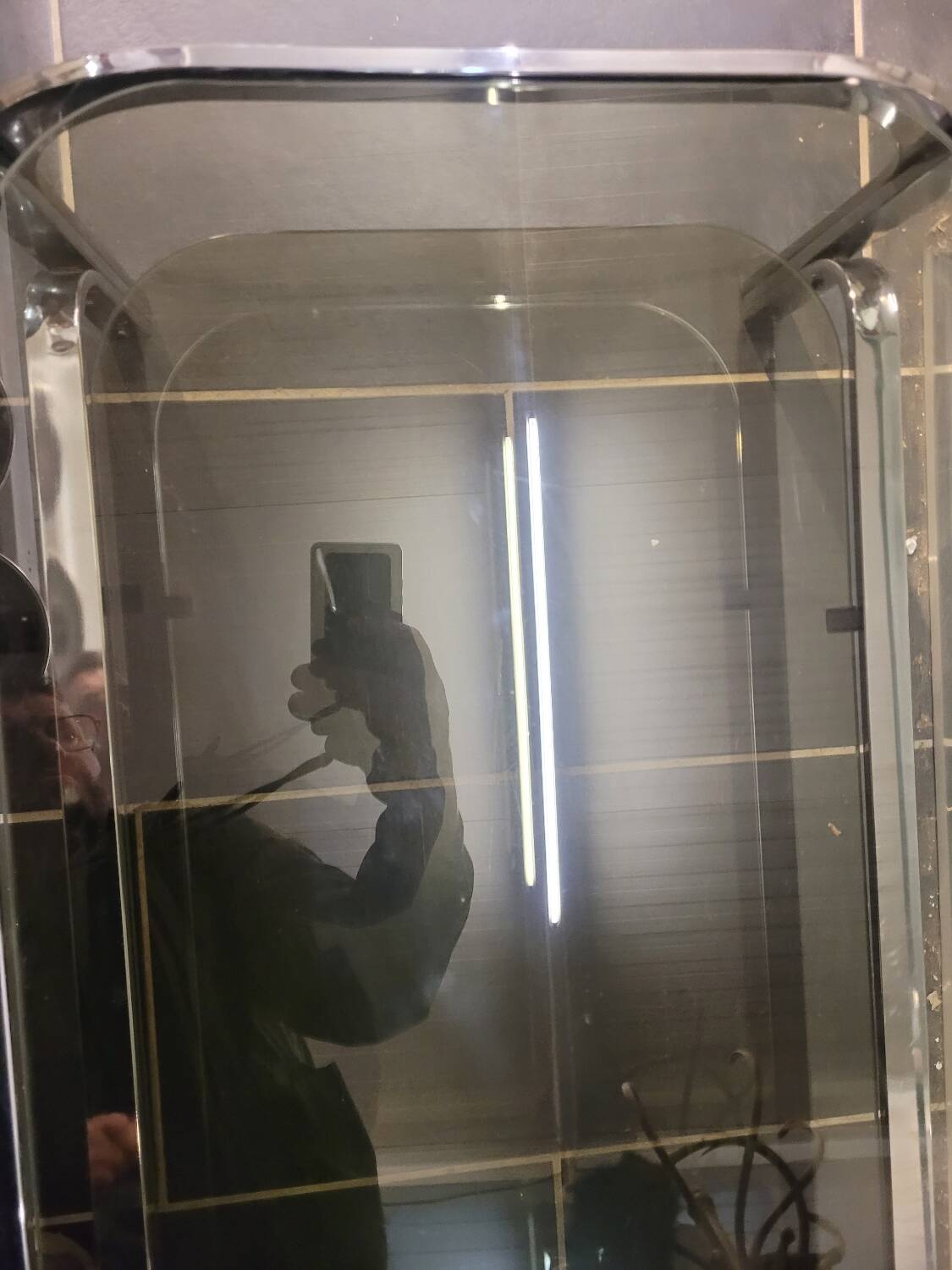 Chromed metal coffee table with smoked glass top from the 70s