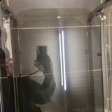 Chromed metal coffee table with smoked glass top from the 70s