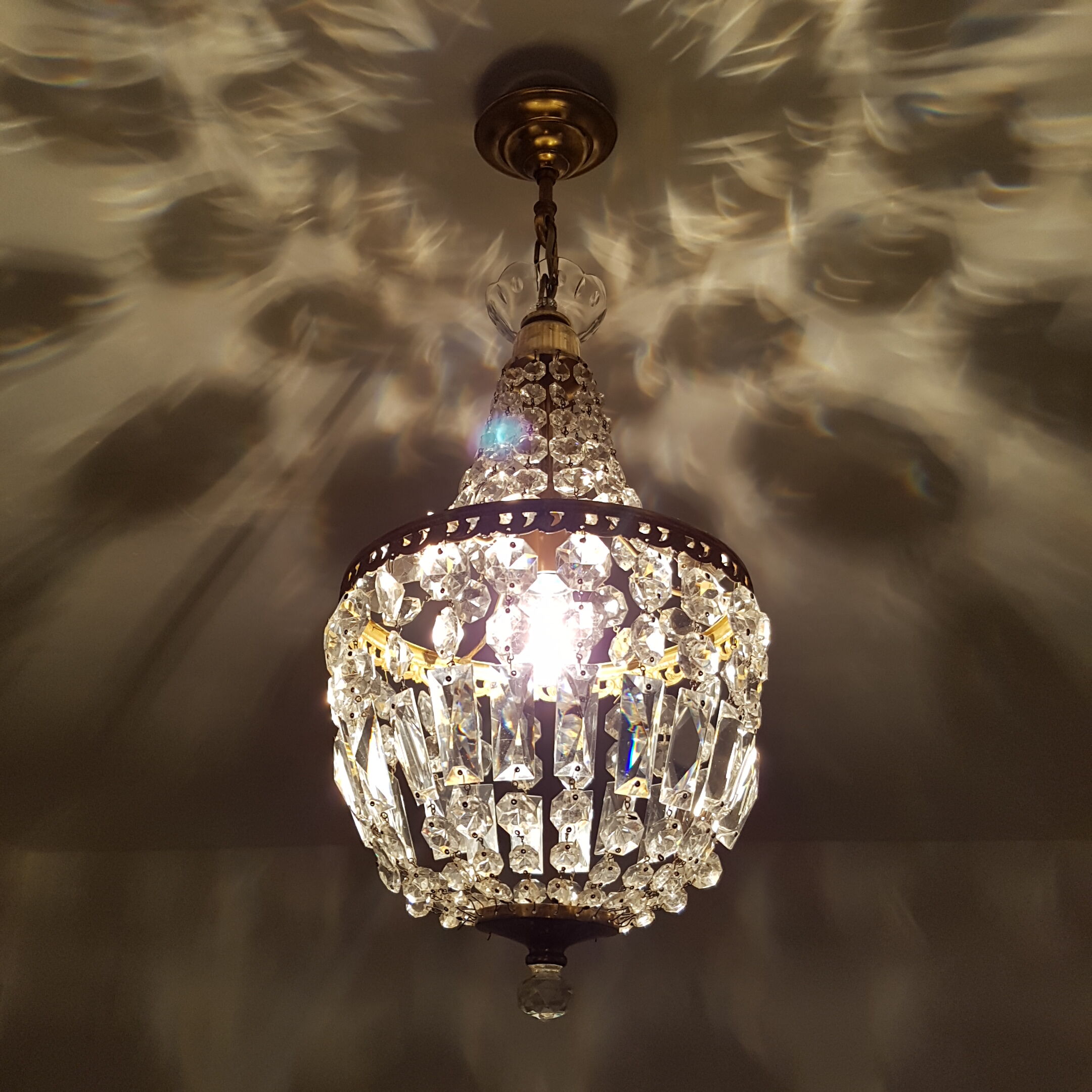 Trash in crystal chandelier