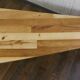 large tripod free-form coffee table
