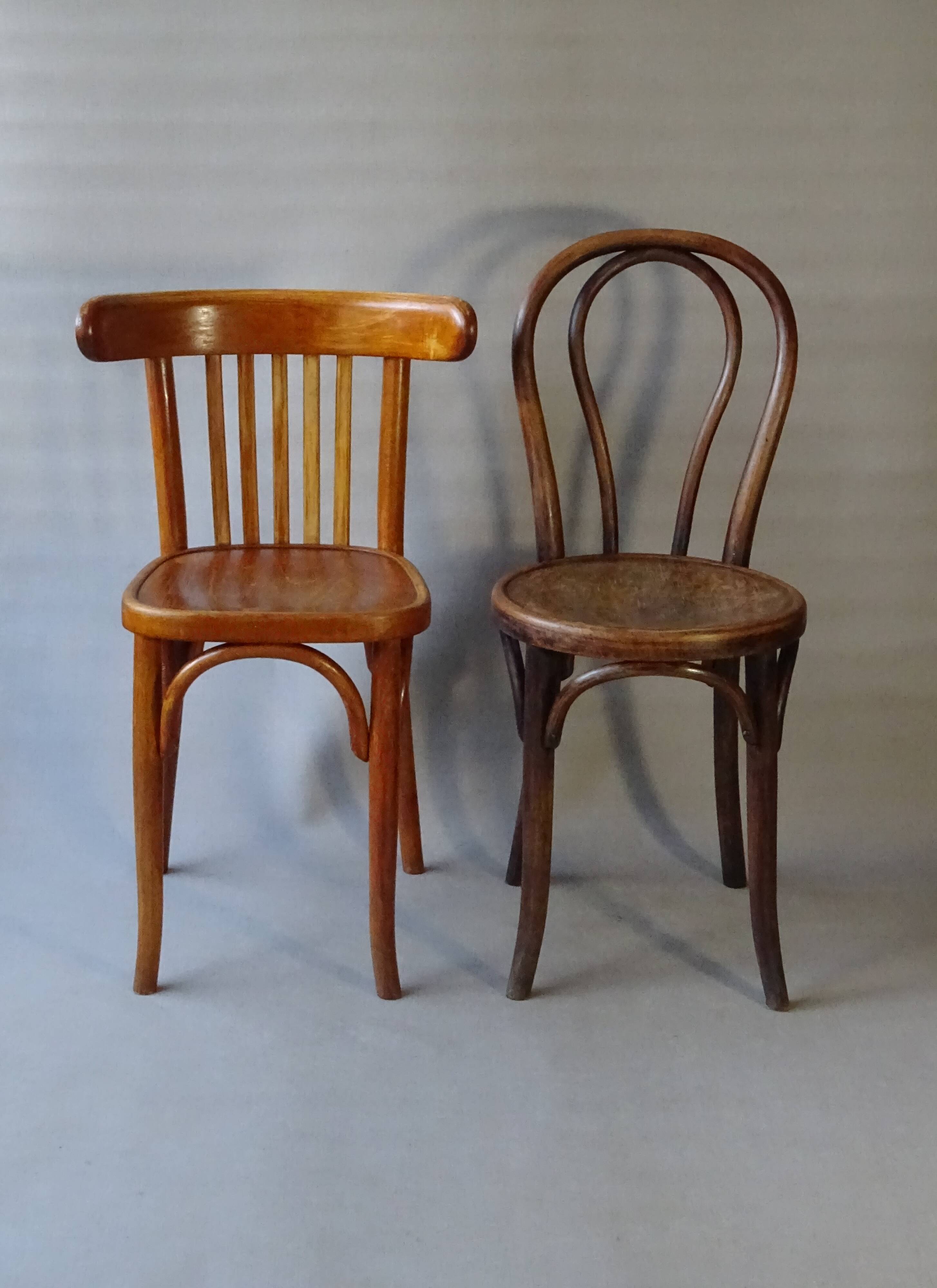 Set of 36 mismatched Bistrot chairs, 1920 to 1950, wooden seats.