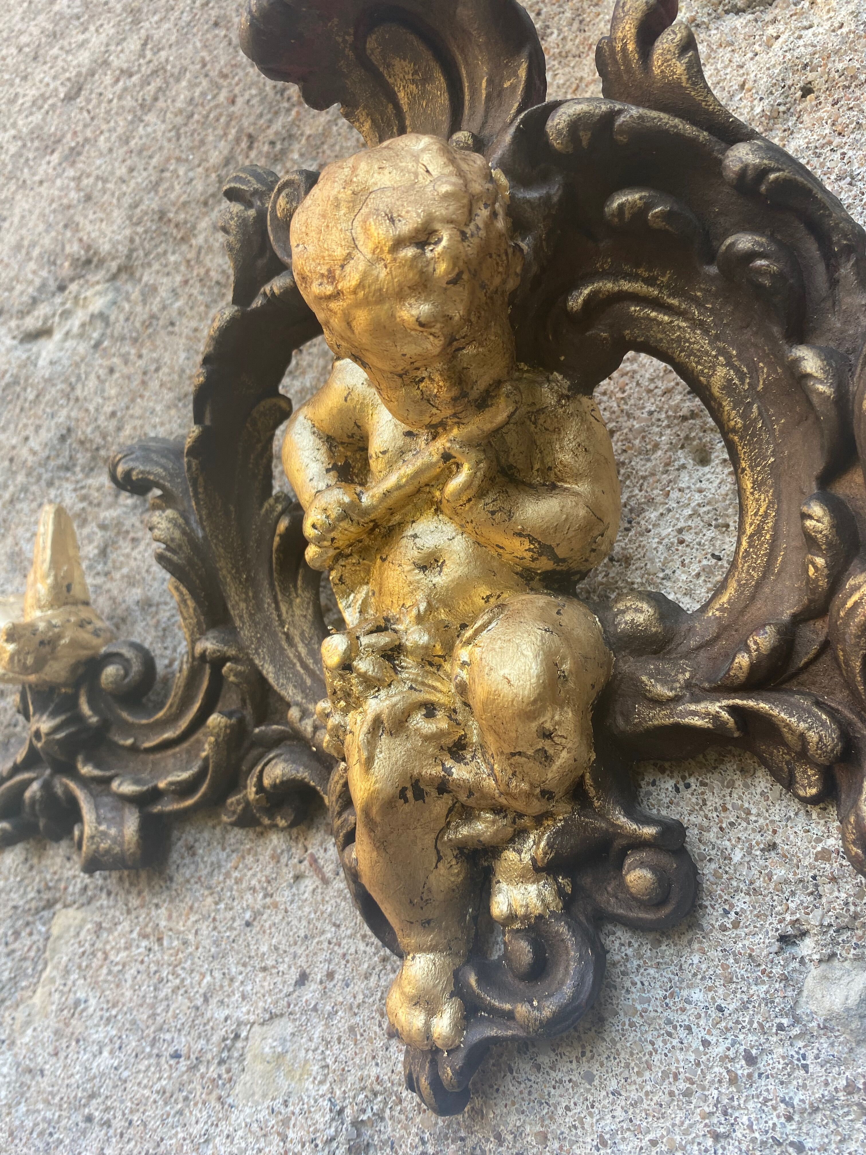 Pediment cherub musician