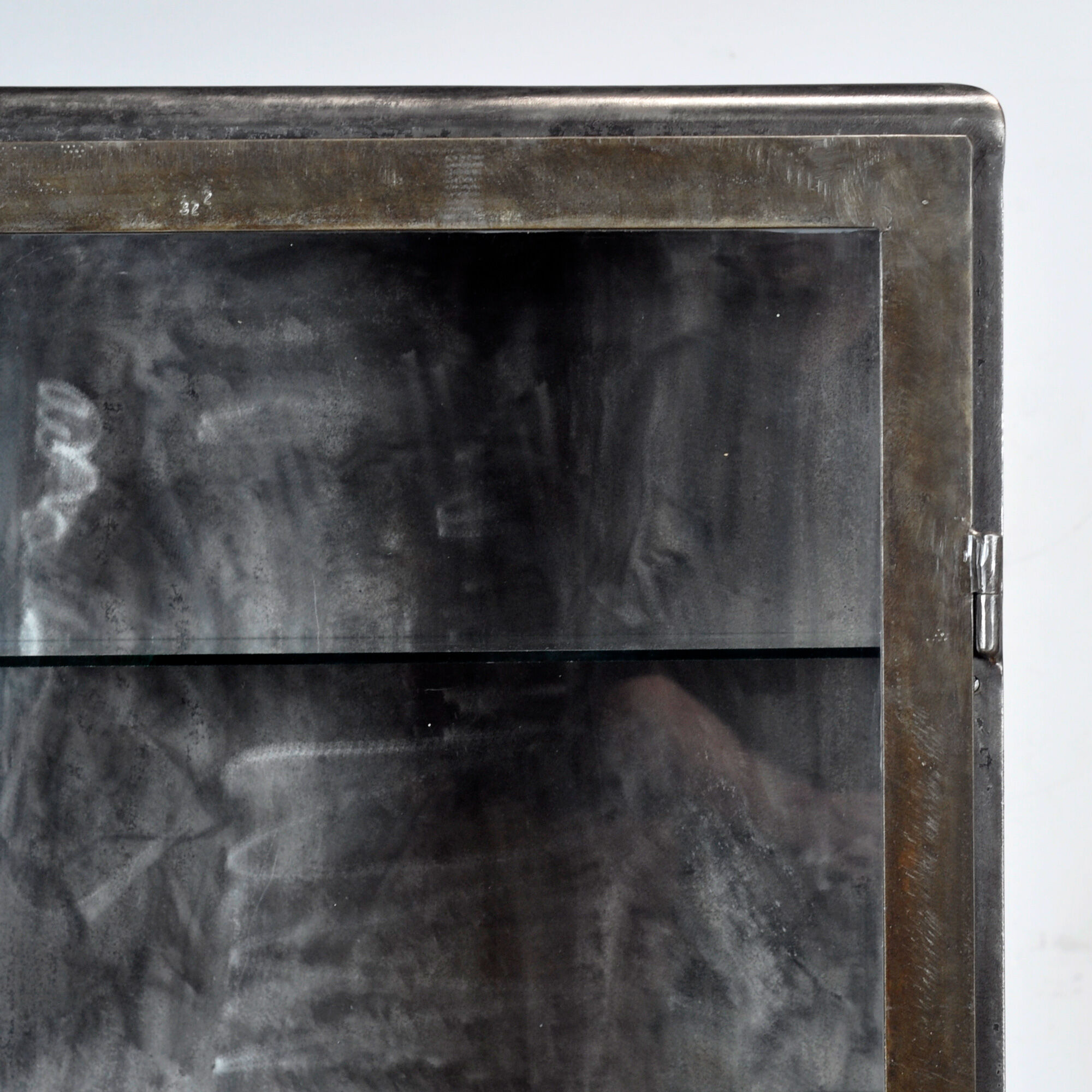 Polished iron medicine cabinet, 1920s