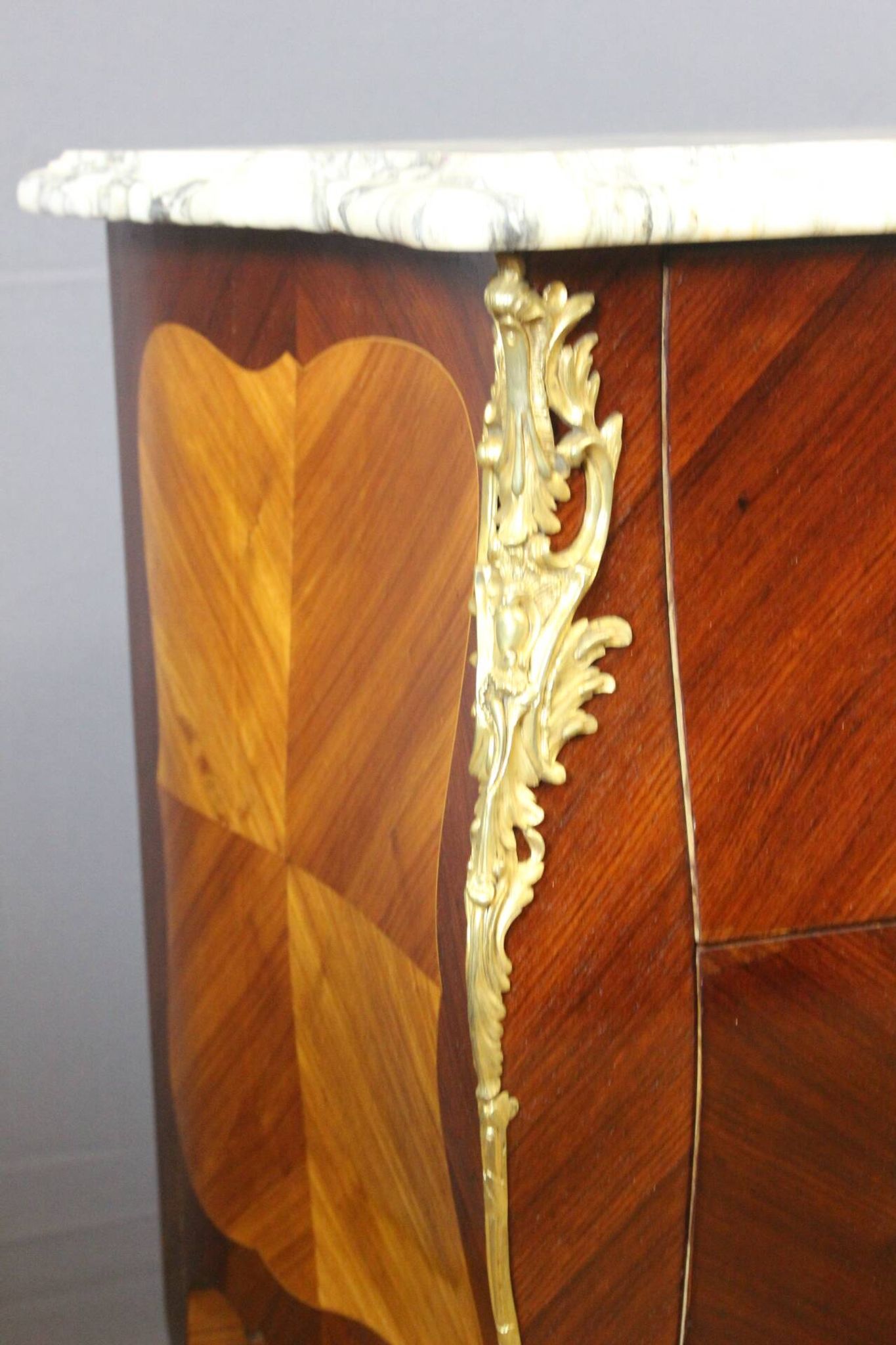 Louis XV style commode in marquetry around 1900