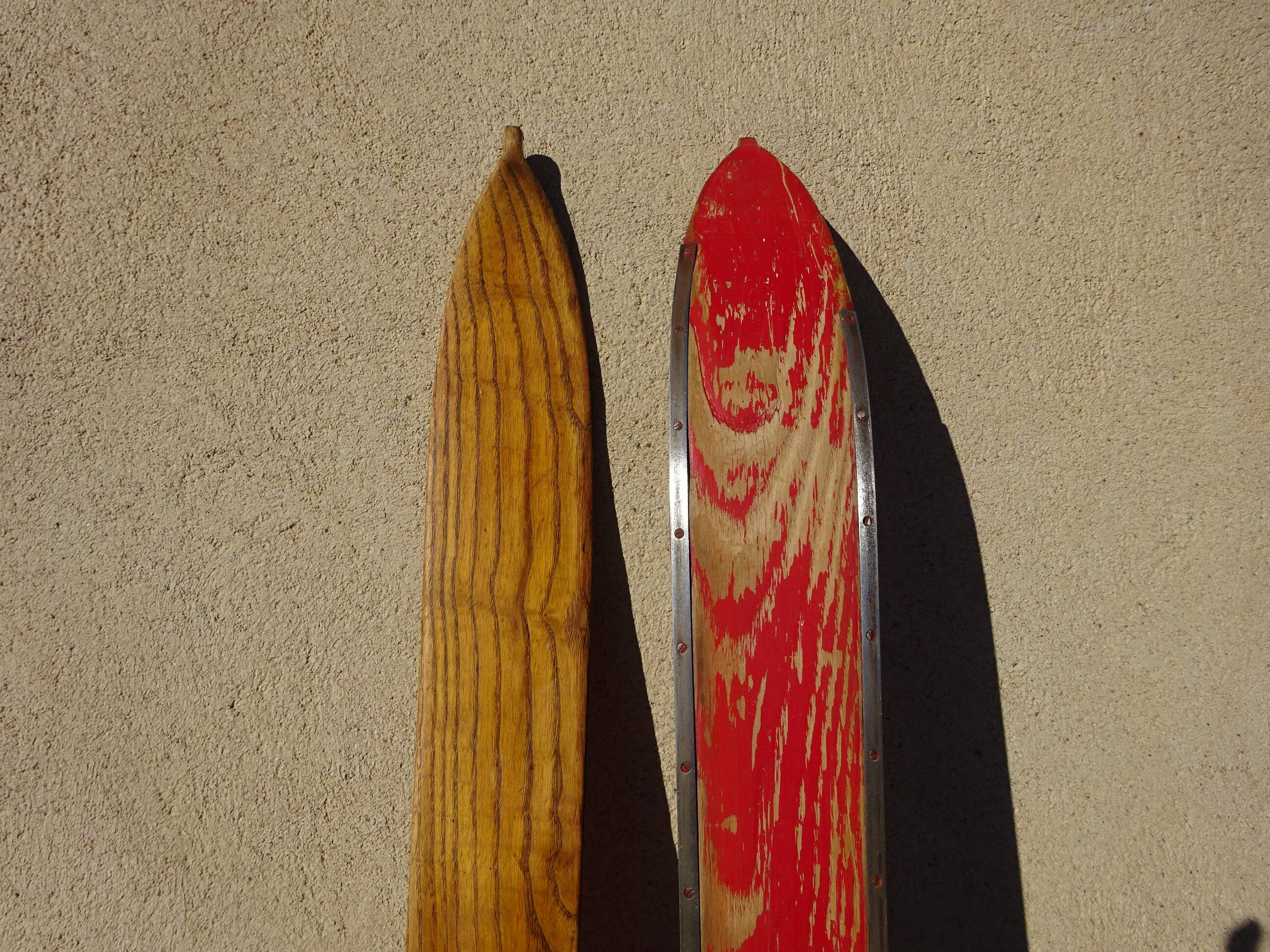 Pair of old wooden skis and metal bindings altiere
