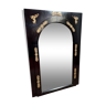 Empire mirror in black lacquered wood and gilded bronze nineteenth century