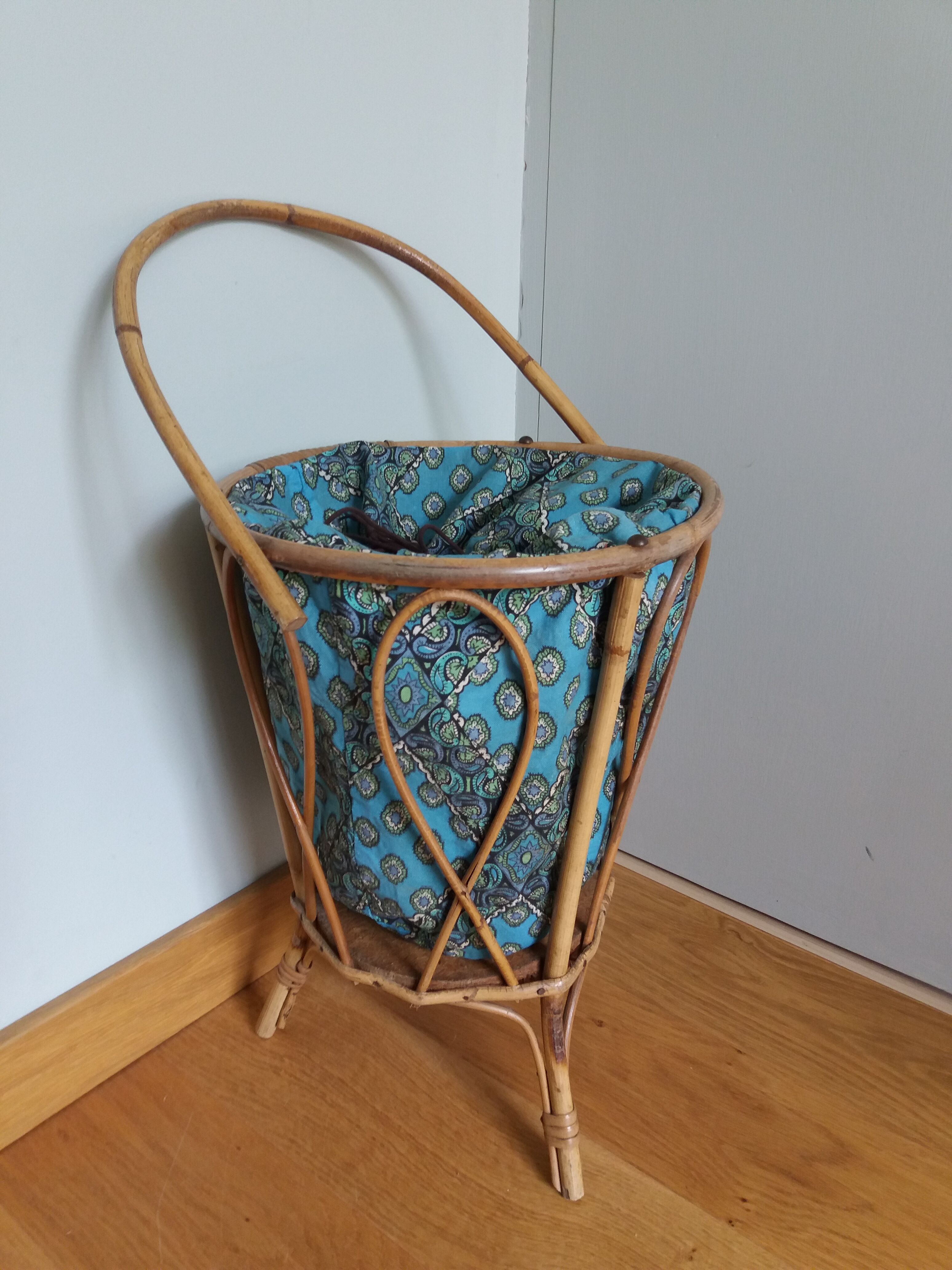 Wicker worker round basket with work, knitting