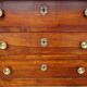 Antique chest of drawers with cross motifs, made entirely of solid walnut.