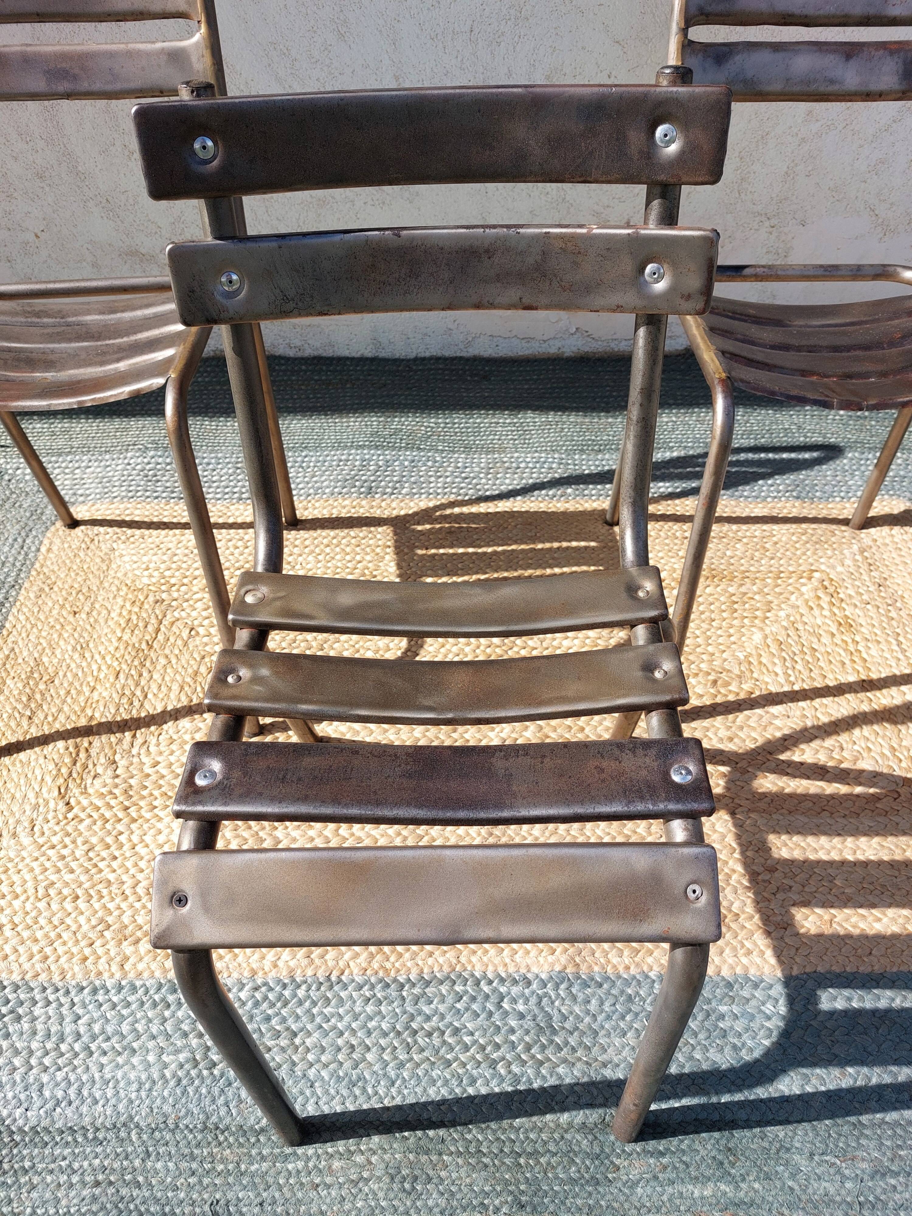 3 metal chairs, Tolix style
