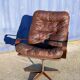Fauteuil pivotant vintage cuir bois et métal