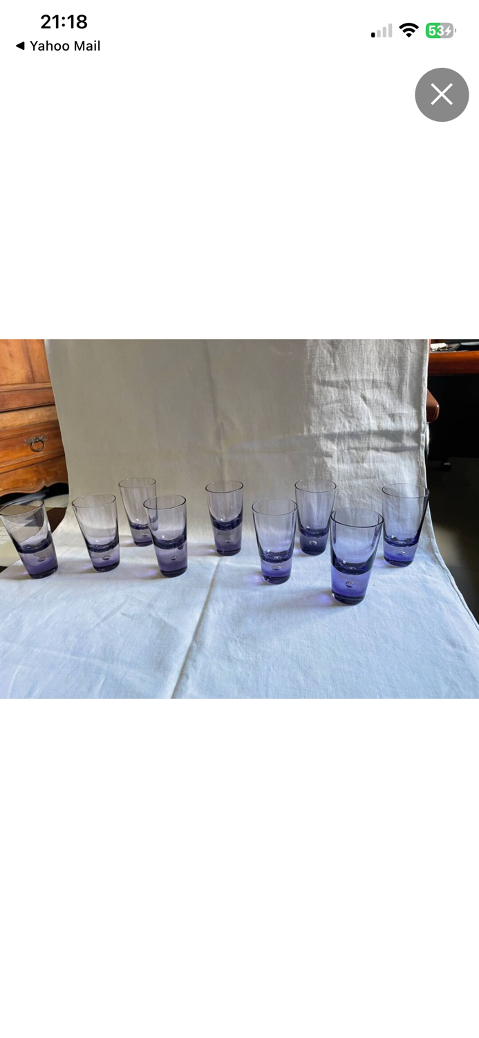9 short glasses in purple glass