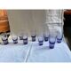 9 short glasses in purple glass