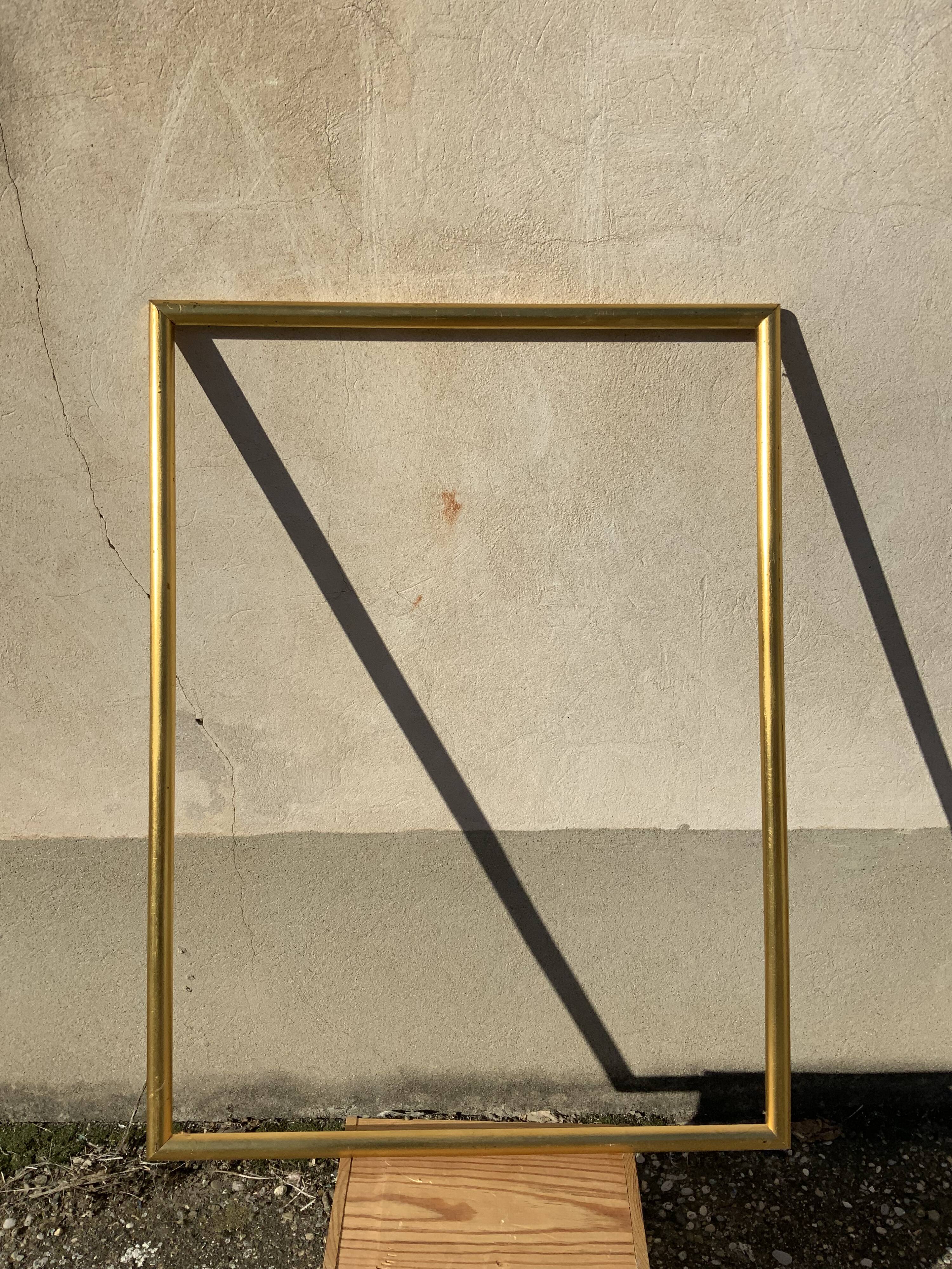 Old frame in gilded wood patina gold leaf