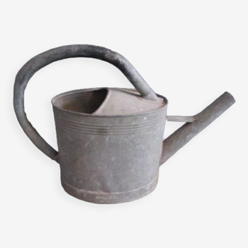 Old zinc watering can