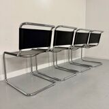Lot of 4 tubular chairs designed by Mart Stam in vintage black leather from the 1980s.