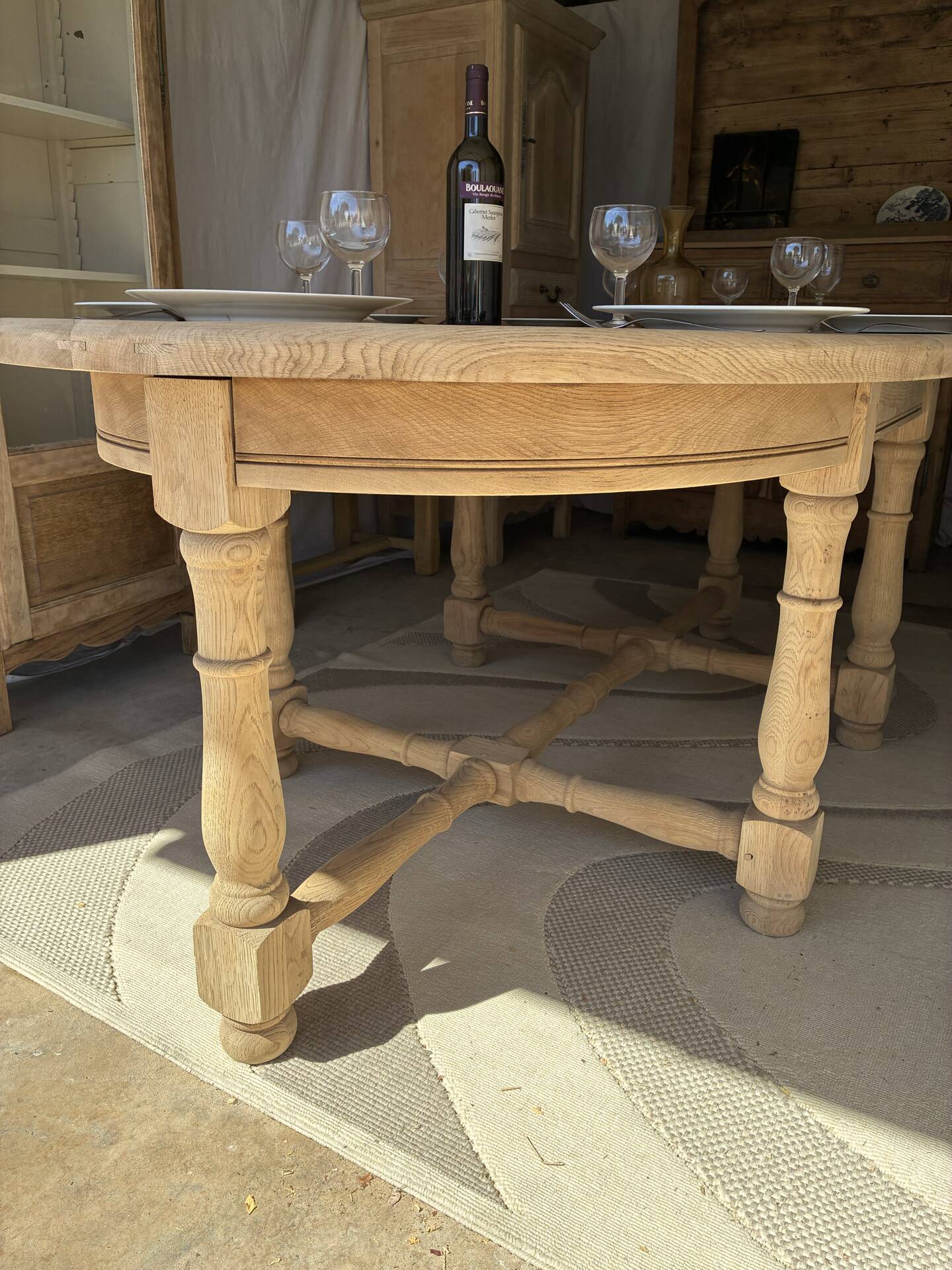 Solid oak farmhouse table with extensions.