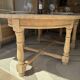 Solid oak farmhouse table with extensions.