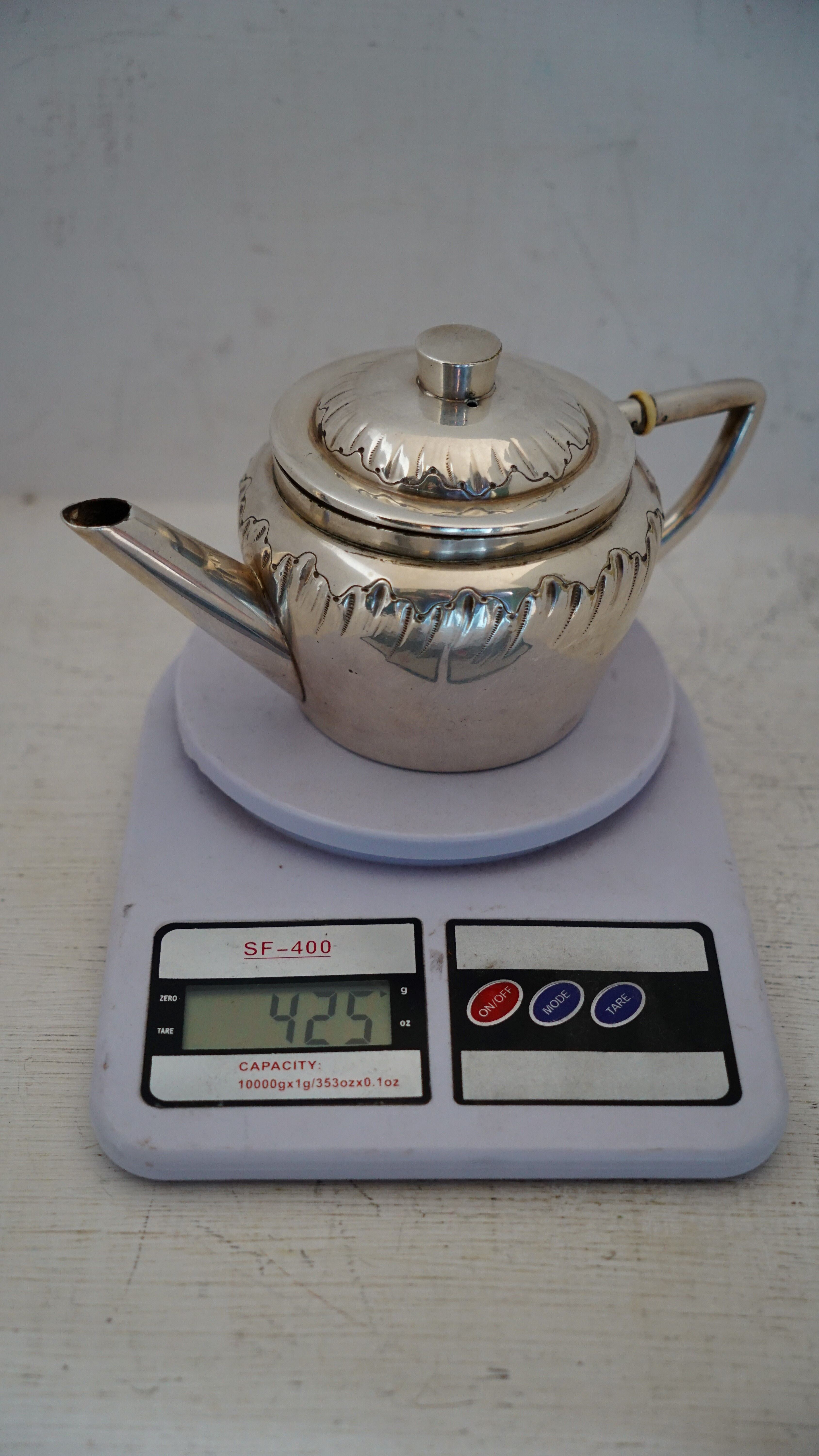 Teapot and milk jug English silverware