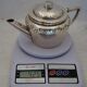 Teapot and milk jug English silverware