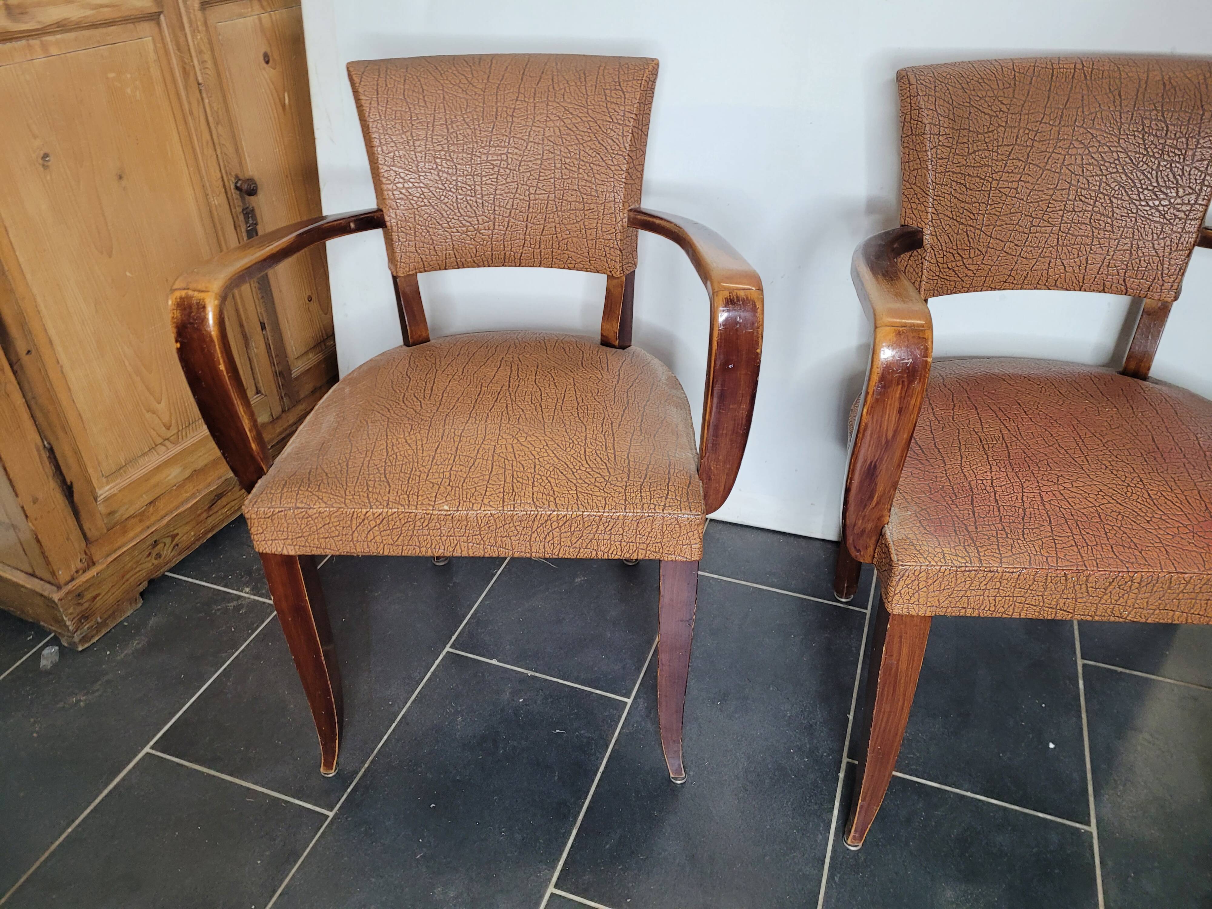 Pair of skai bridge armchairs