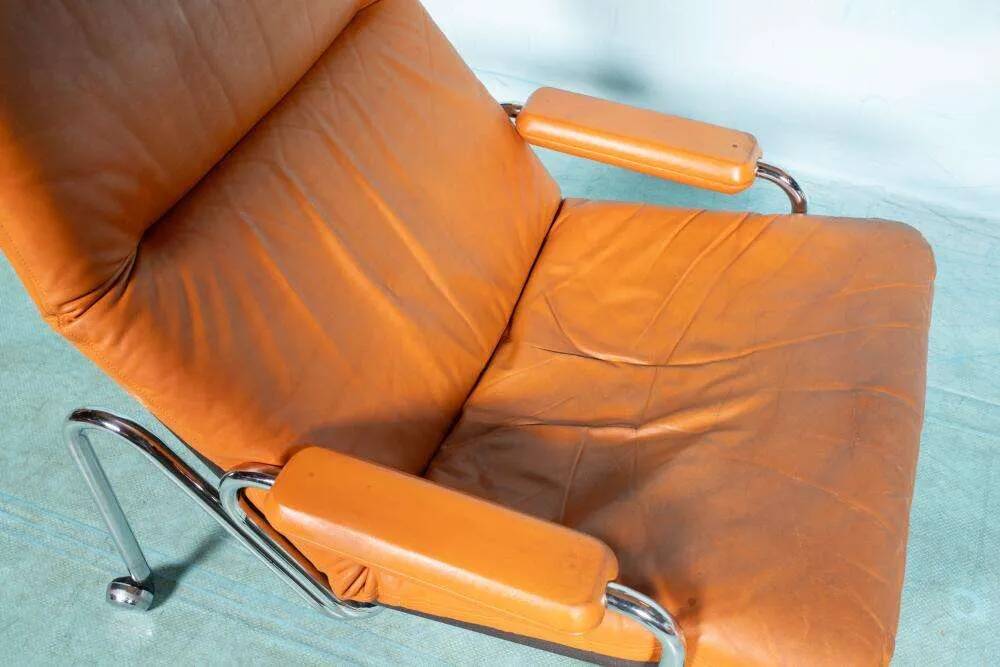 60s cognac leather designer armchair, mid-century modern leather lounge chair.