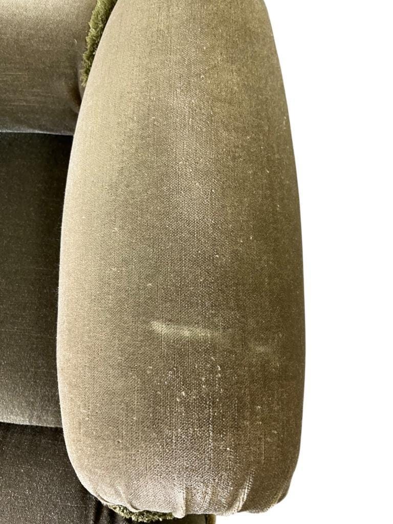 Vintage green two-seater sofa with fringes