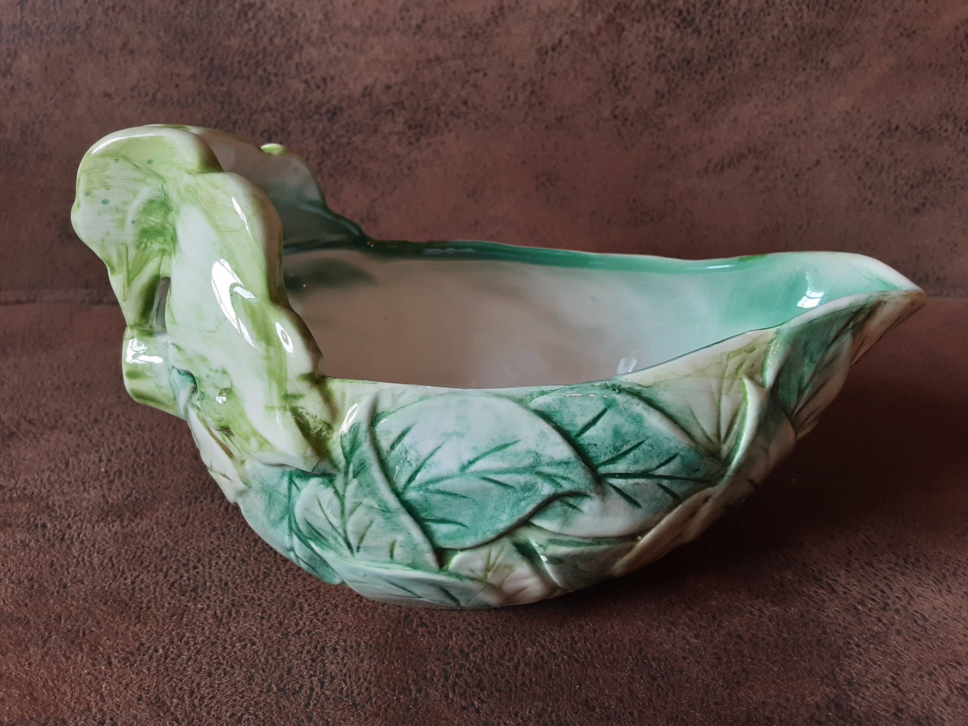 Gravy boat in barbotine style