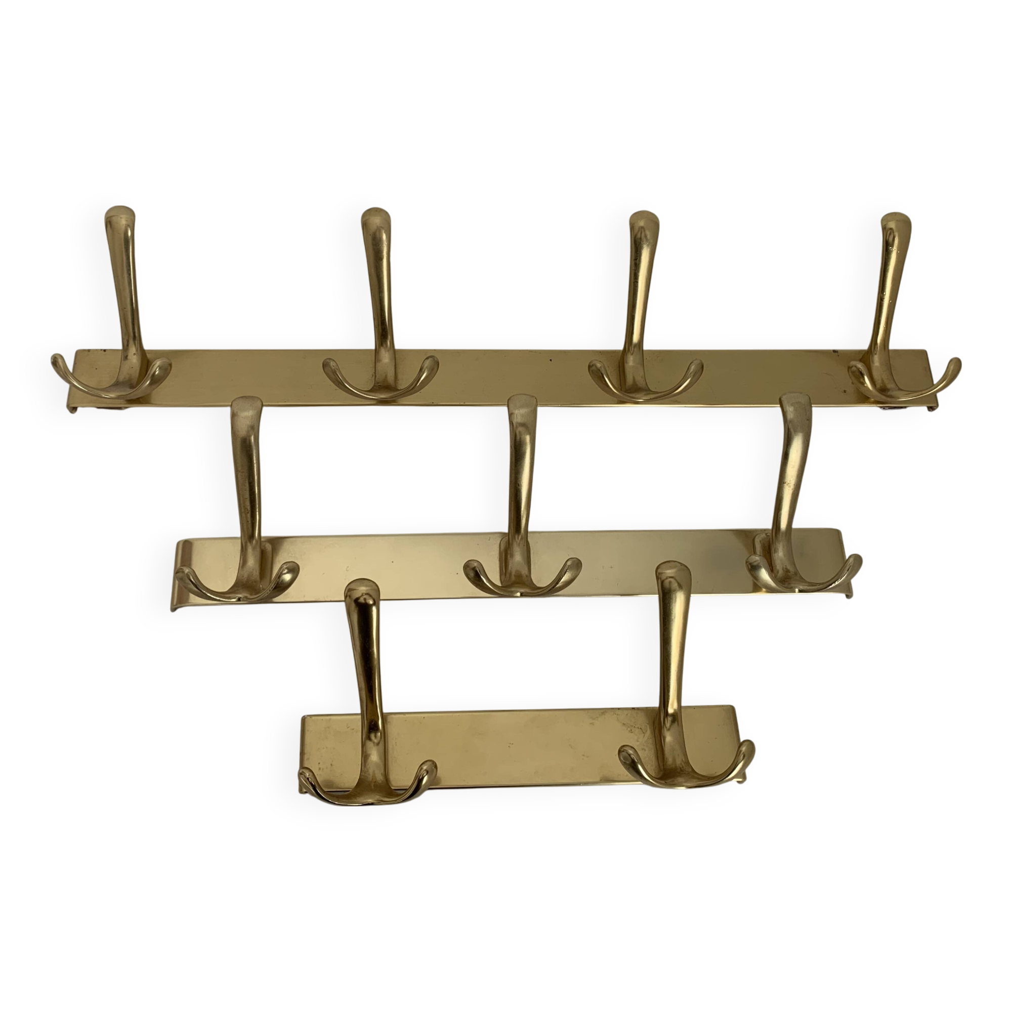 Three vintage 1960s gold coat racks with 4, 3 and 2 hooks