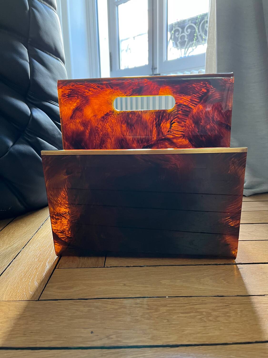 1970s lucite tortoiseshell magazine rack