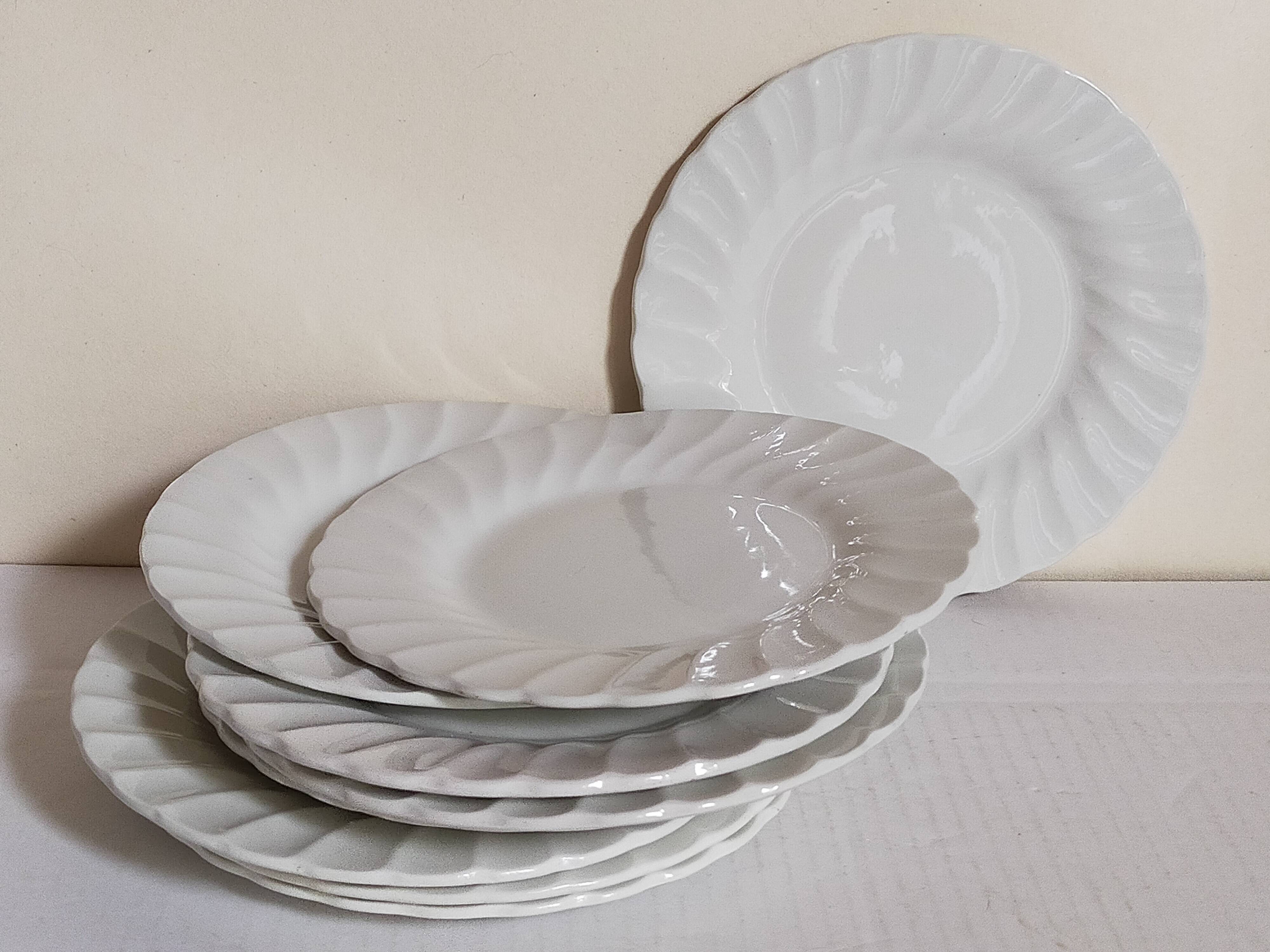 Nine fine English porcelain sweet plates