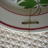 Old repaired plate stapled