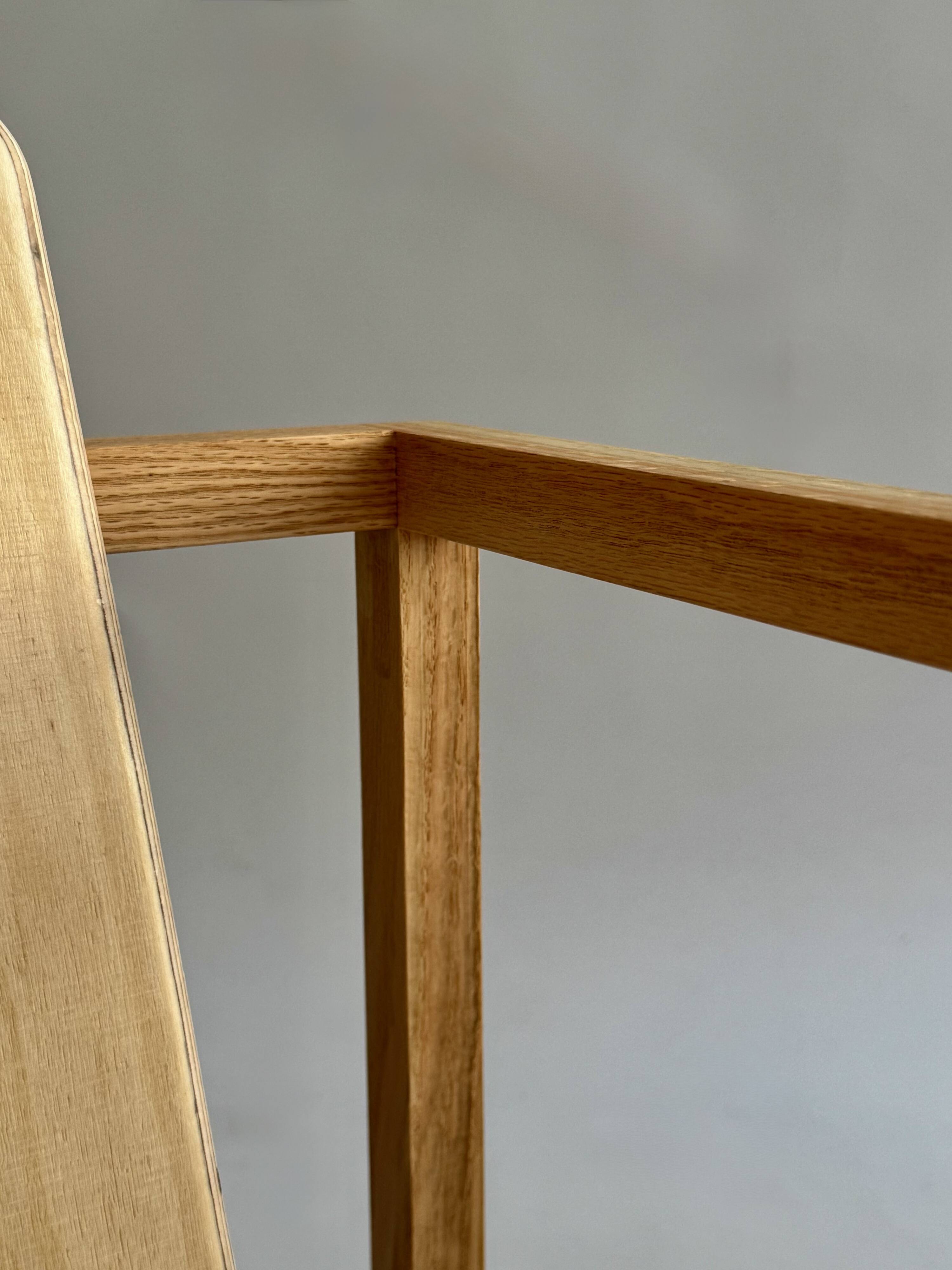 Pair of handmade wooden armchairs