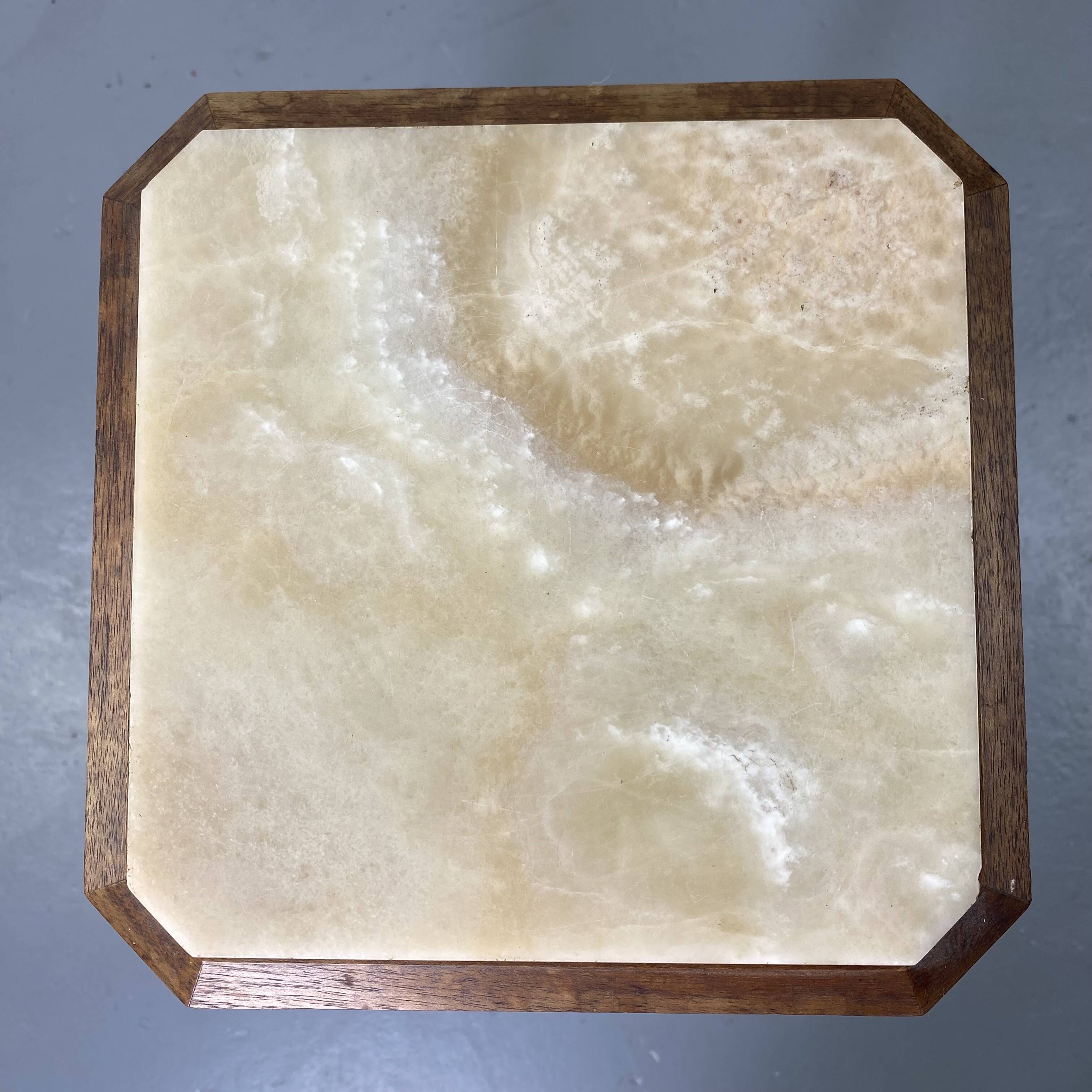 Wooden stool with marble top