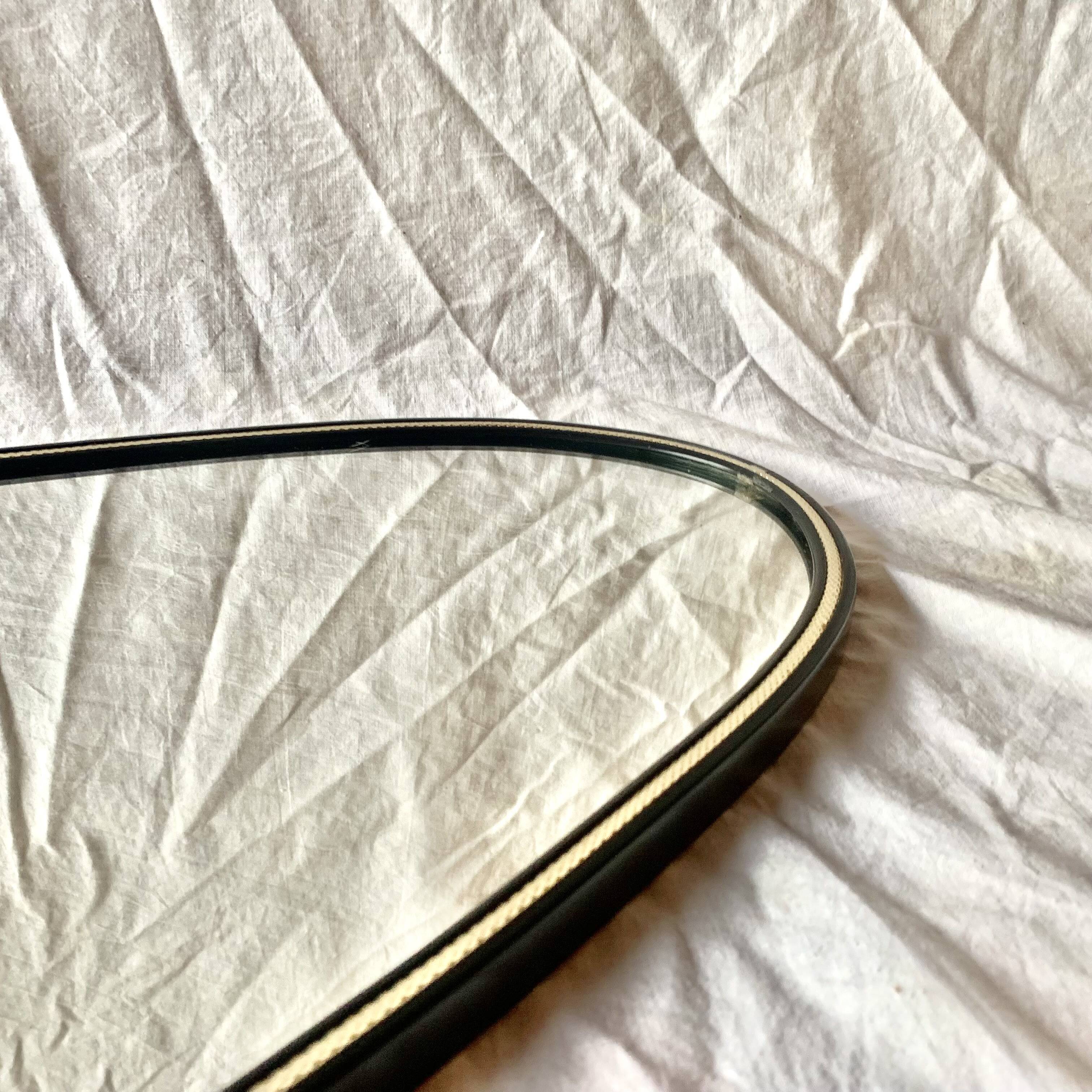 Antique rearview mirror - black and gold plastic frame - 34 x 55 cm