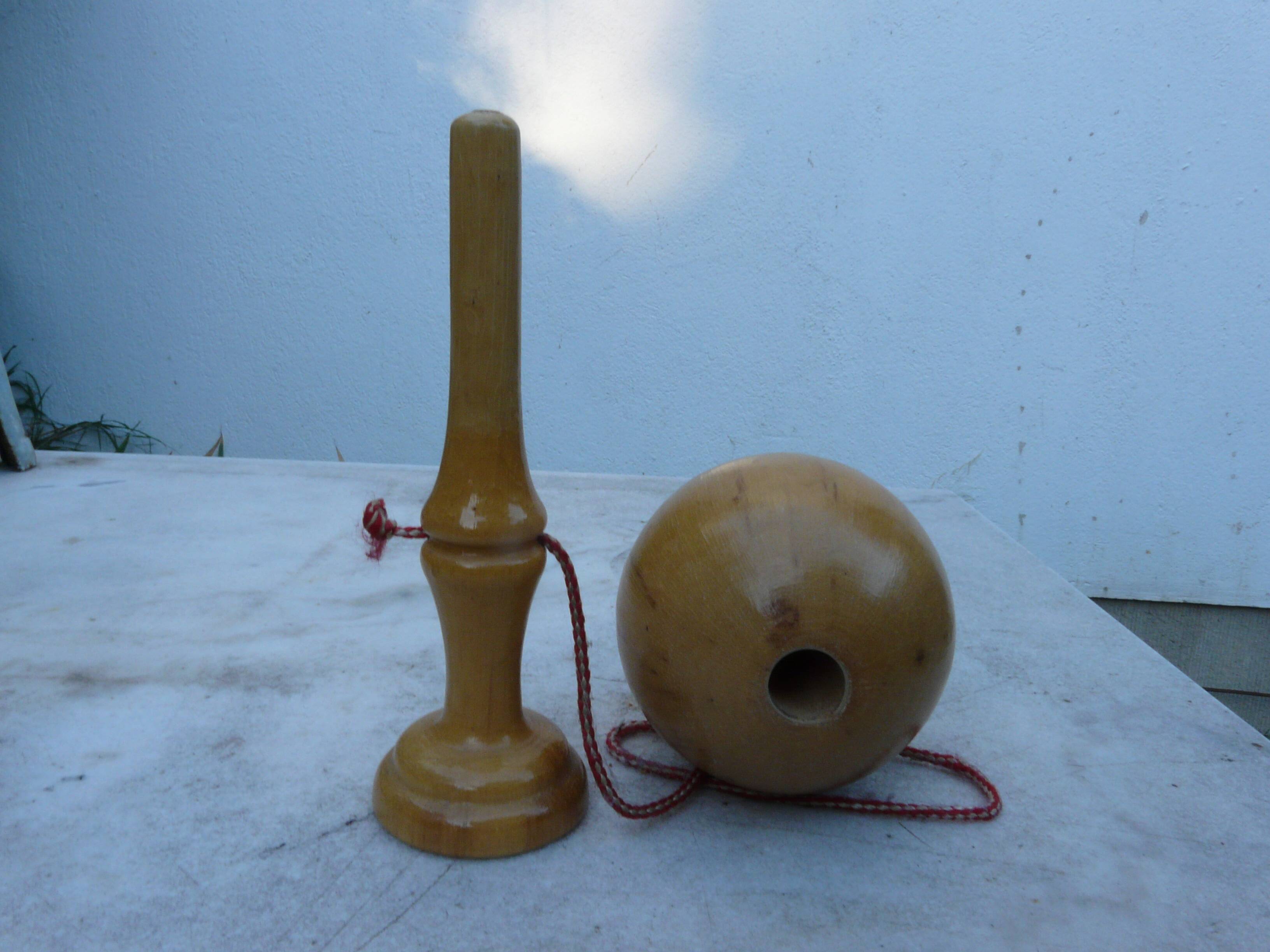 Old wooden bilboquet