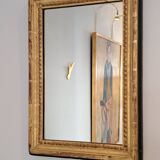 Miroir ancien en bois et stuc doré
