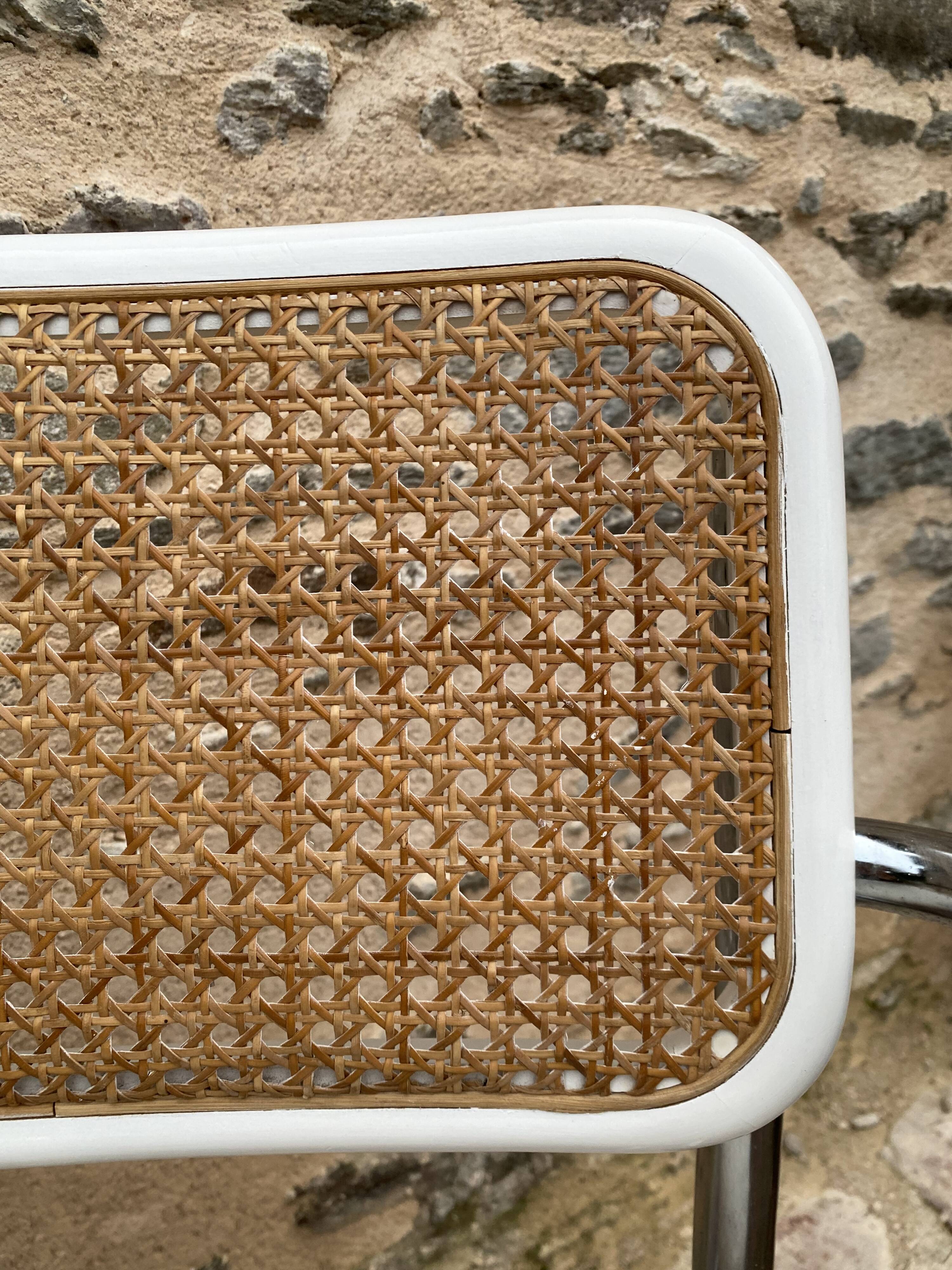 Cantilever armchair in cane and bouclette fabric