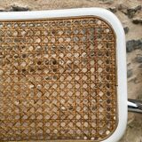 Cantilever armchair in cane and bouclette fabric