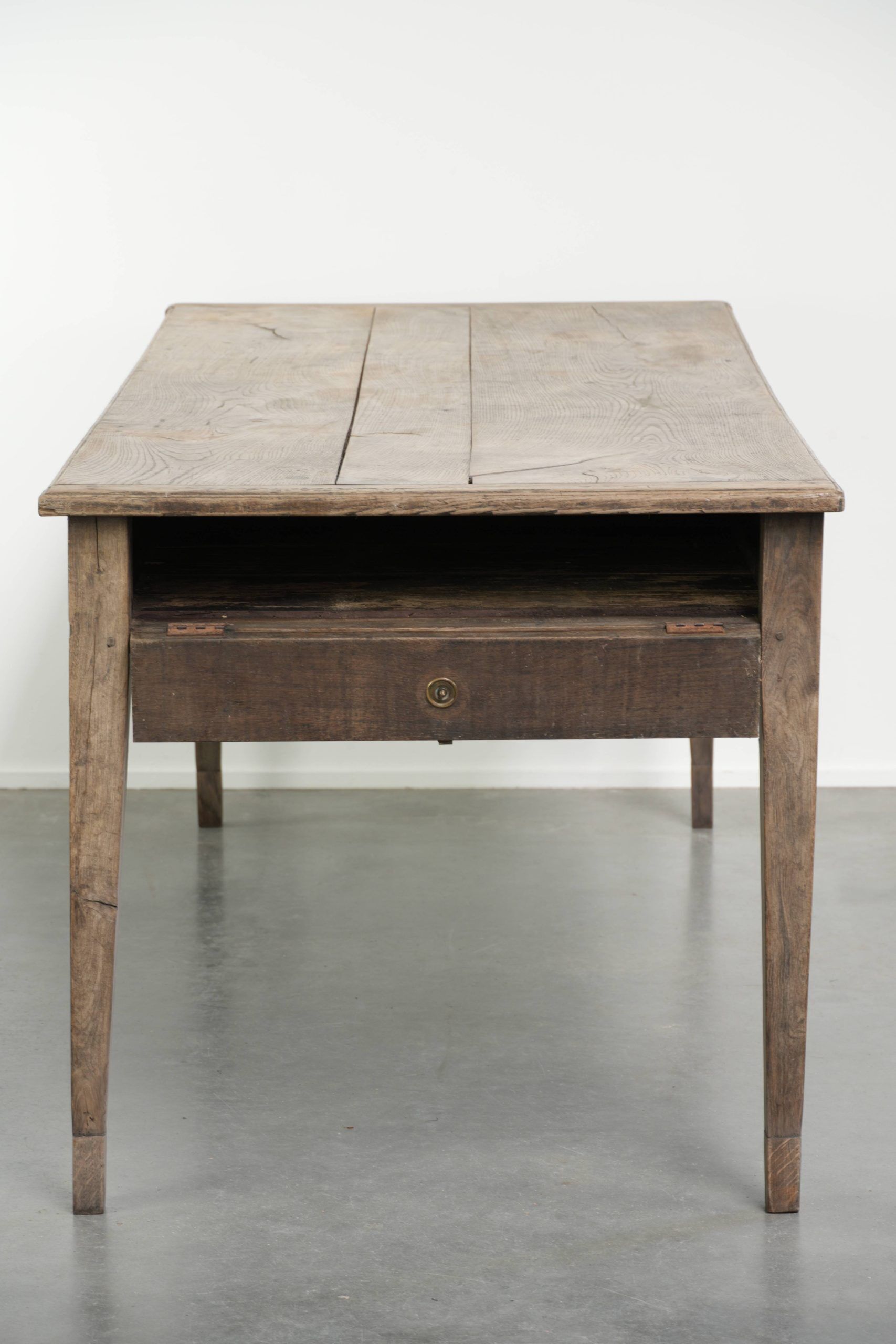 Antique French oak dining table for 6 to 8 people with a baguette drawer