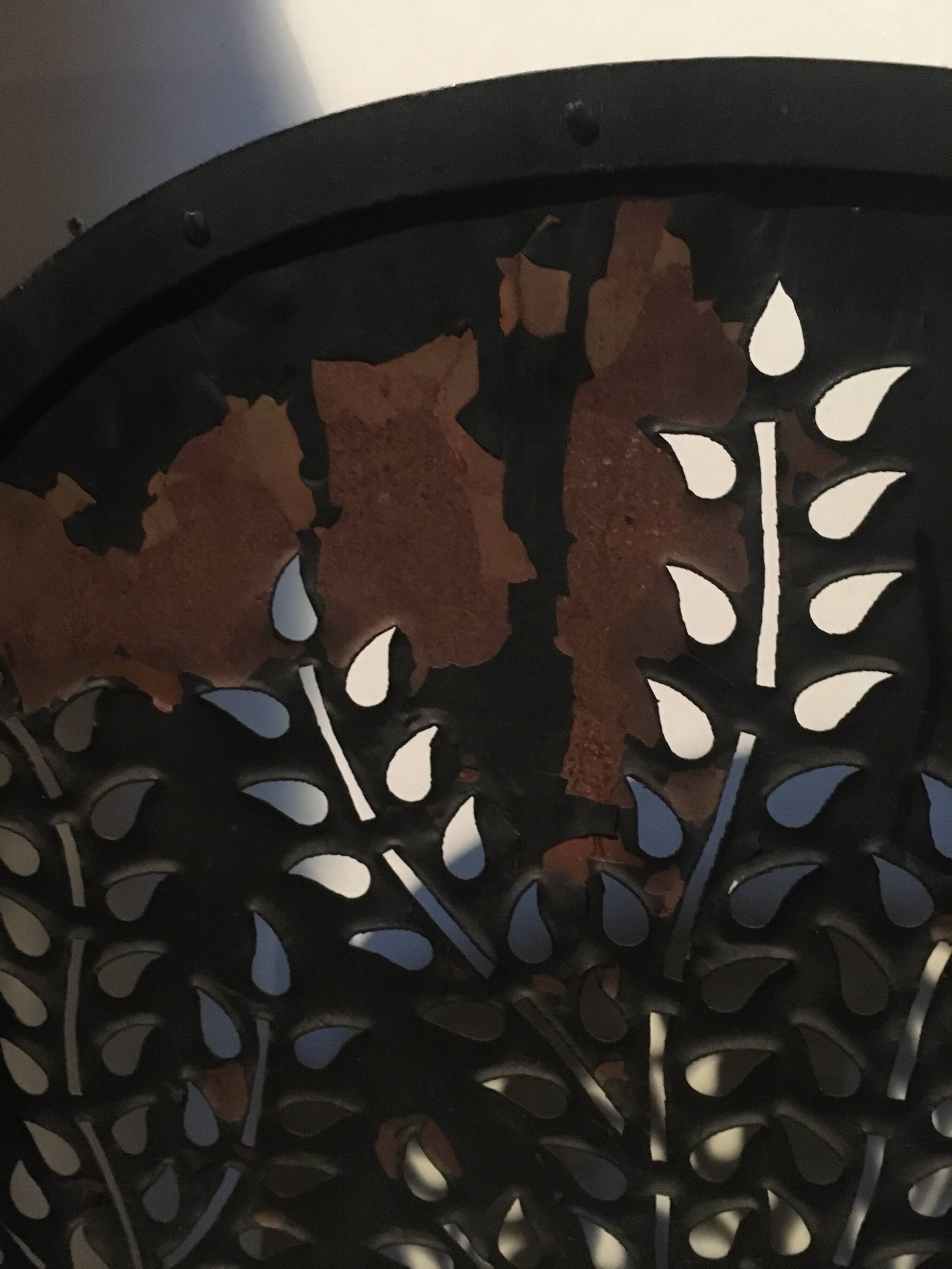 Wrought and cut metal fire screen