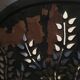 Wrought and cut metal fire screen