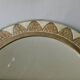 Large round Moroccan mirror in chiseled brass and copper, 1970s-1980s