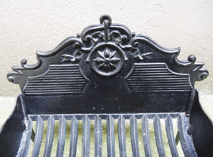 Old gate, cradle with cast iron logs