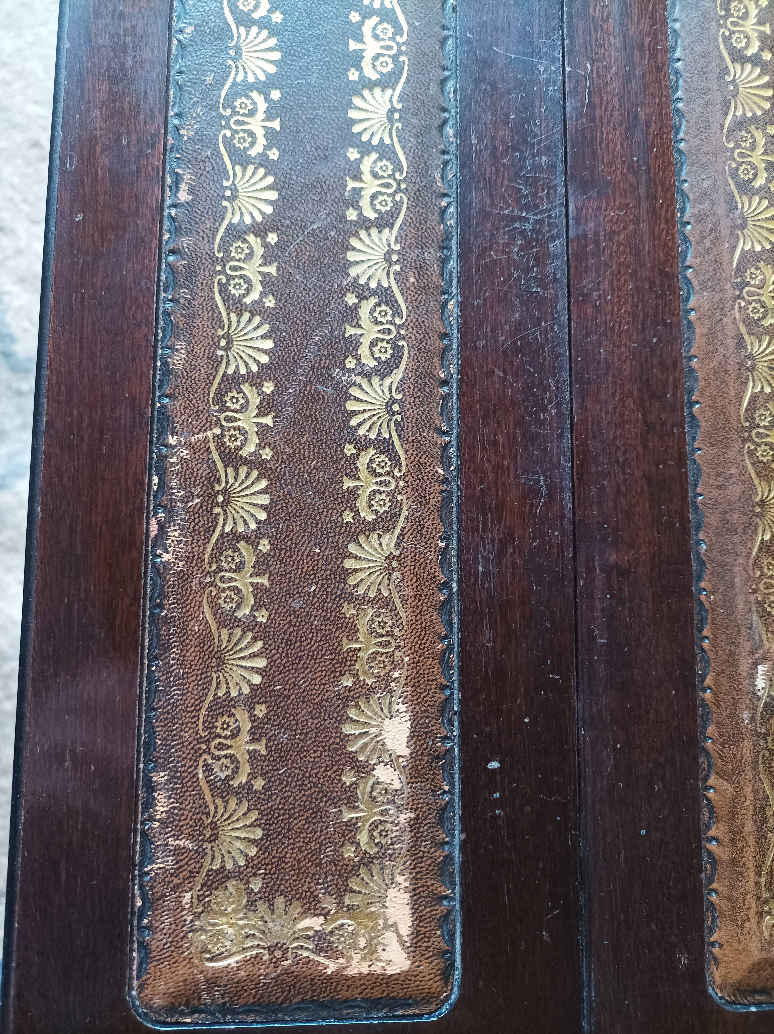 Folding table with a leather top